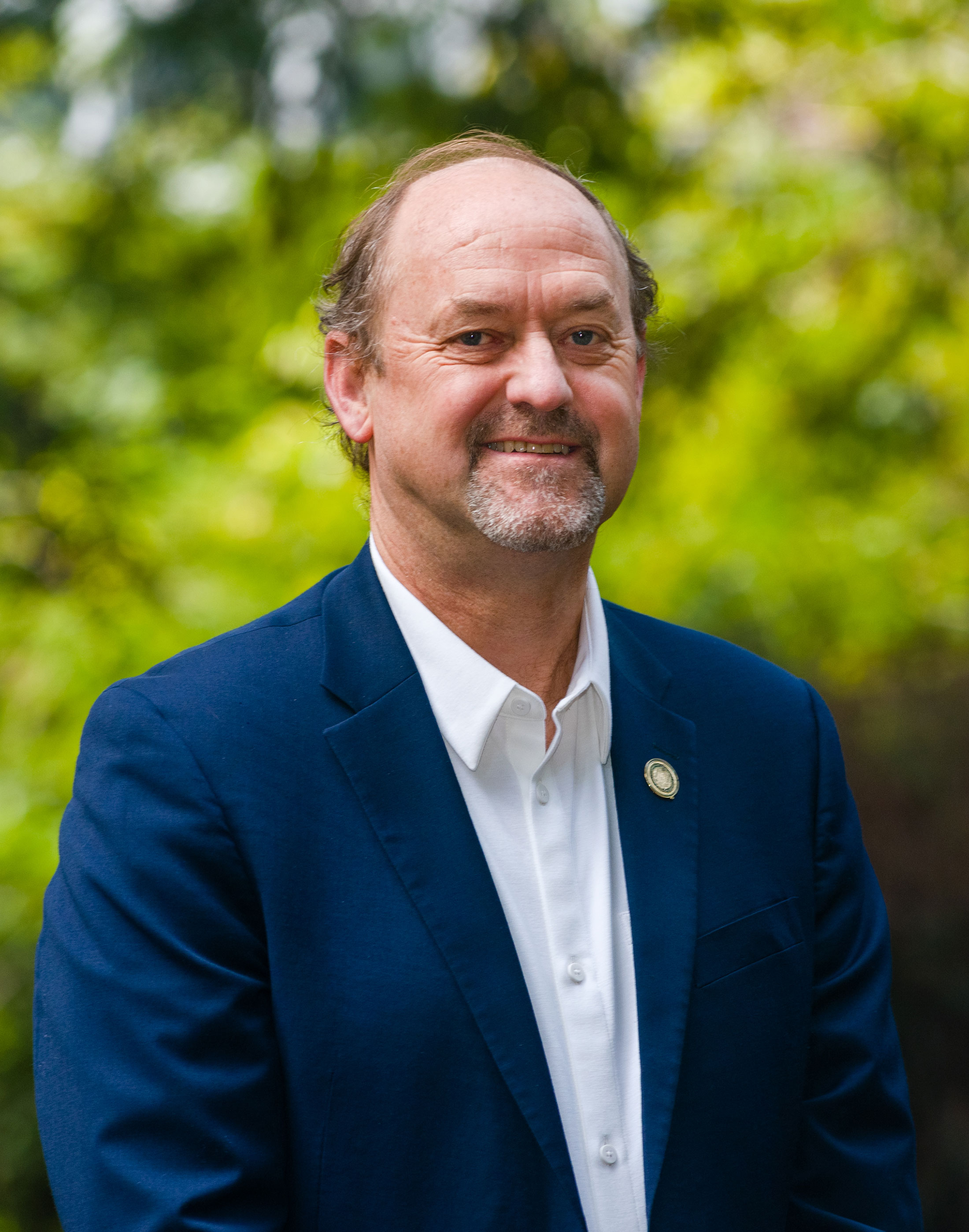 David Ackerly standing in a forest