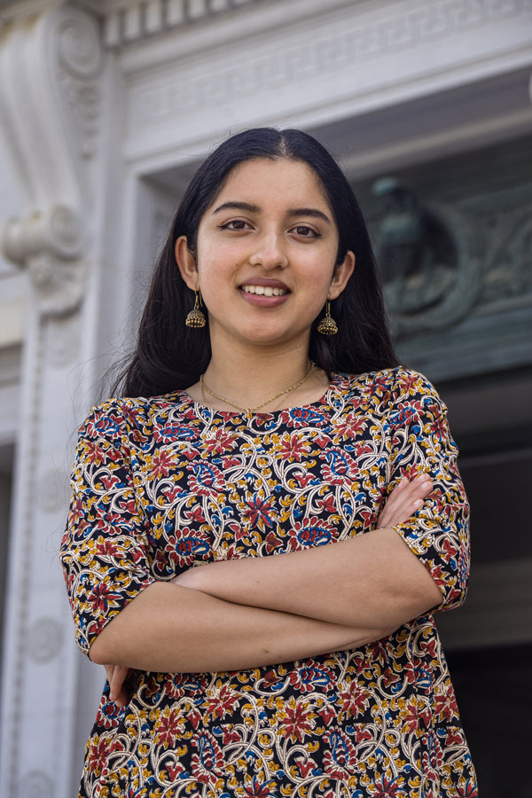Image of Shreya Chaudhuri with Doe Library in the background