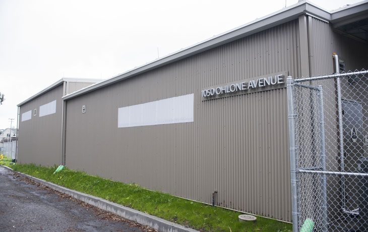 A photo of the facade of the Gill Tract Agricultural Operations Building