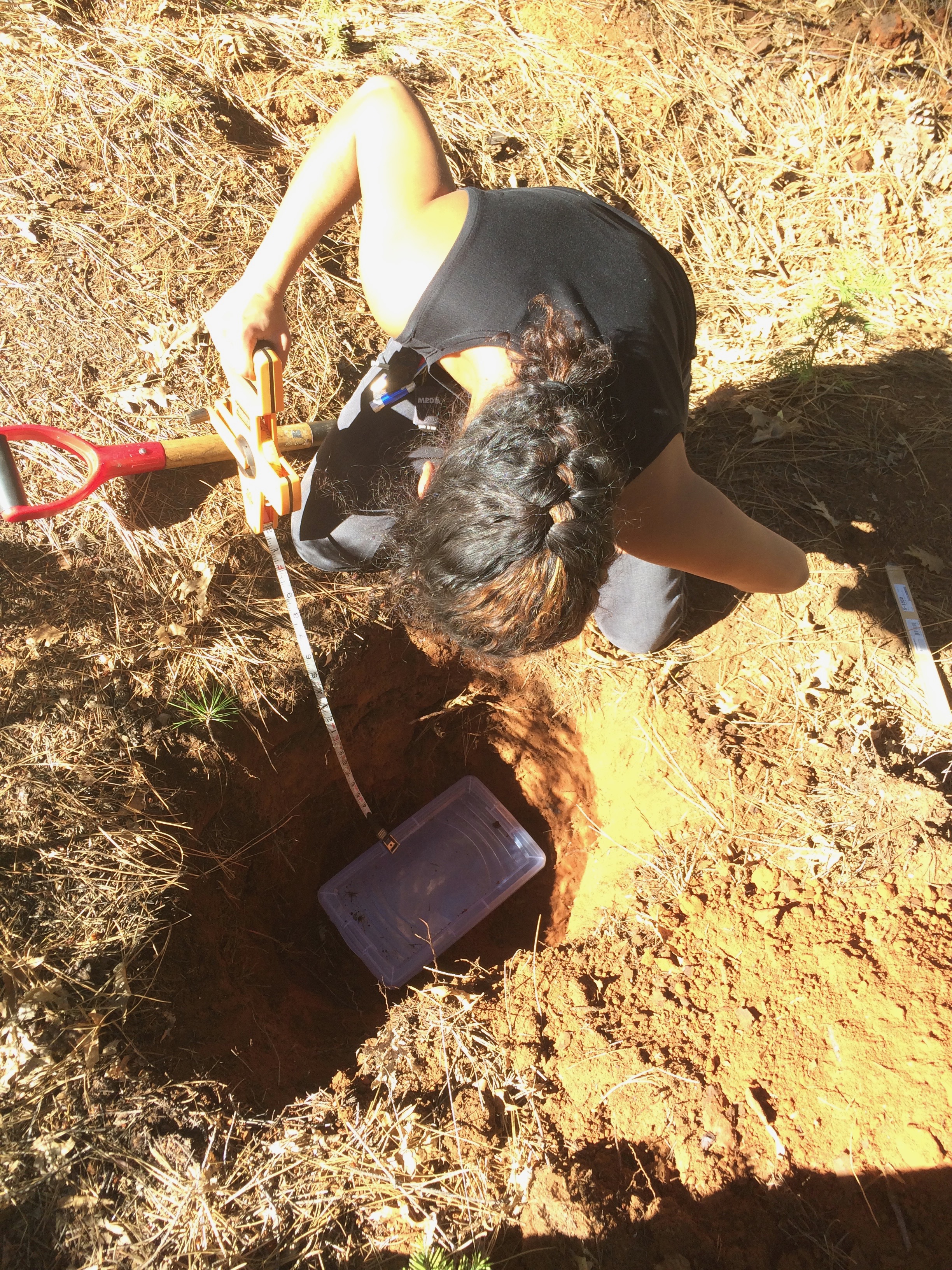 Neem Patel collects soil Neem Patel collects soil