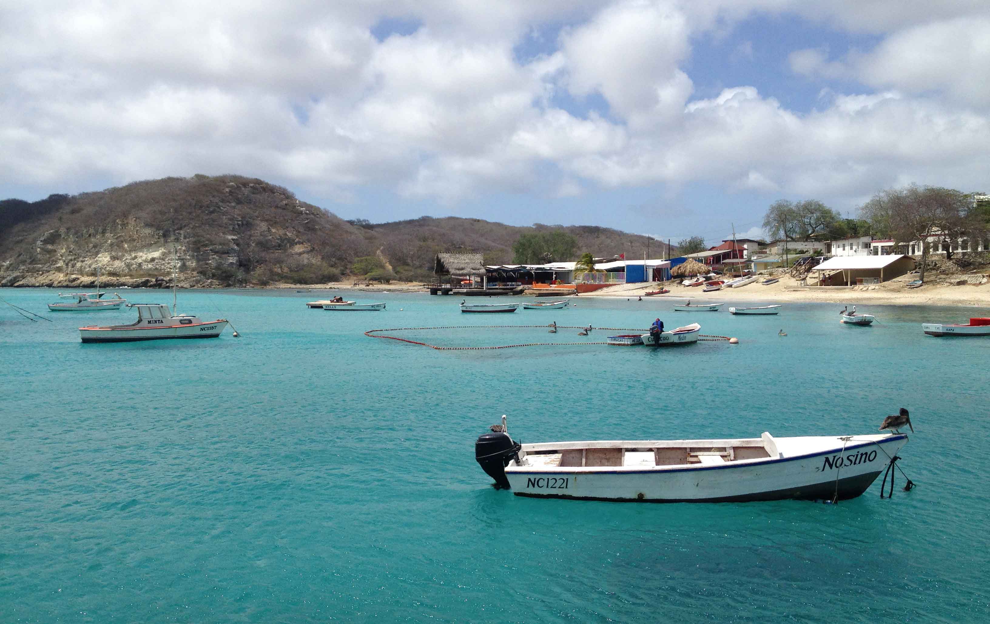 Fishing boats in a deep blue Caribbean sea