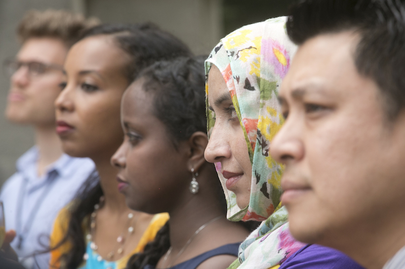 People from diverse cultures, listening. People from diverse cultures, listening.