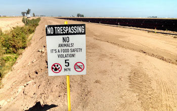 Sign showing animals as threat to food safety