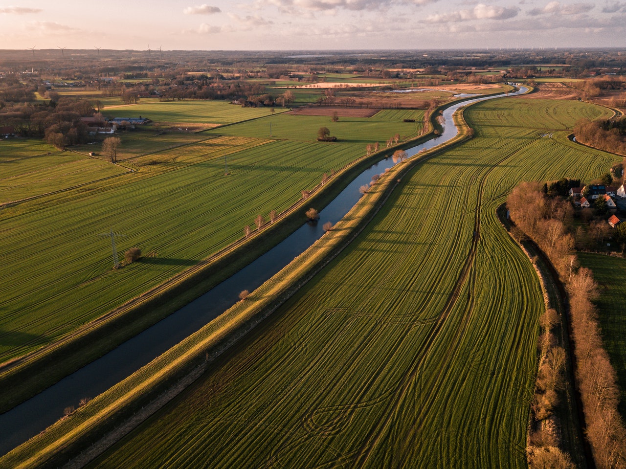 Water running through agricultural lands.
