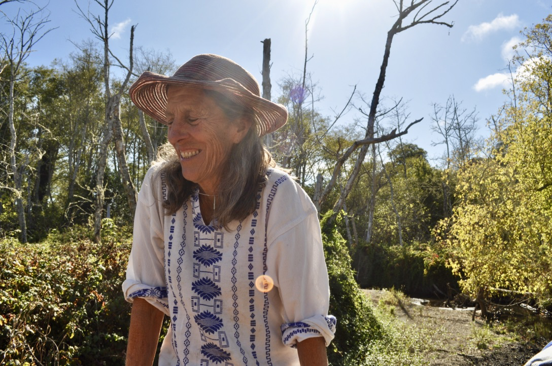 Photo of a woman in a garden.