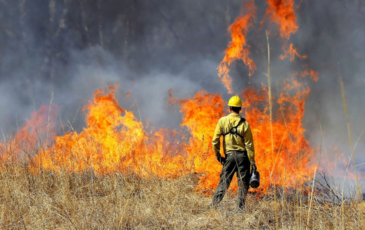 Firefighter in front of fire 