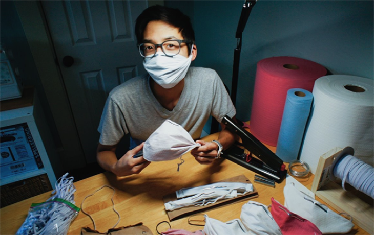 Researcher Christopher Gee making masks