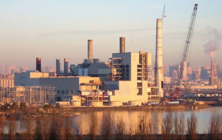 a coal plant at sunset