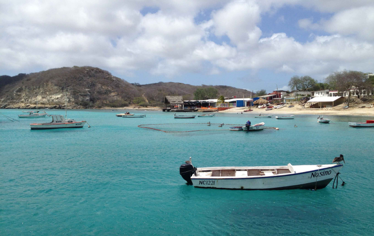 Fishing boats in a deep blue Caribbean sea