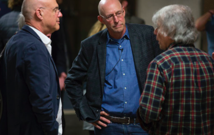 From left: Food writers Mark Bittman and Michael Pollan take with soil science professor Garrison Sposito Monday, Jan. 26, at the opening for the Edible Education course, now based at the College of Natural Resources. 