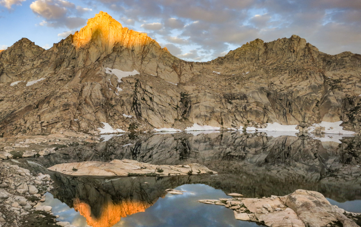 Sunrise over a mountain and lake