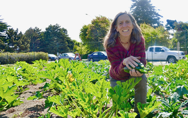 Photo of a woman in a garden. 
