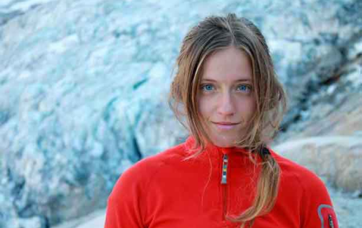 Hope Gale-Hendry in front of large stone background